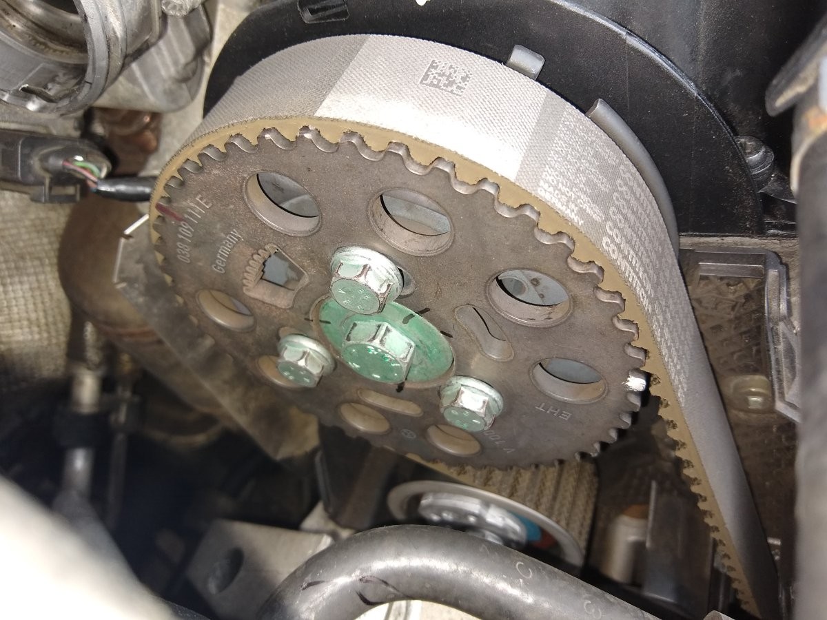 Camshaft retarded in slots, showing torsion value adjustment